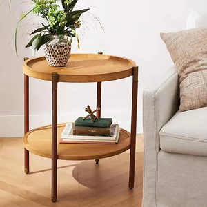 Elegant round wood <b>side</b> <b>table</b> with fluted base and smooth top designed for sophisticated home or office interiors - Product Image 1