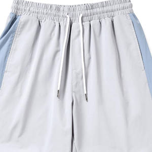 100% Nylon blanco Casual Cargo pantalones de hombre logotipo personalizado cordón cierre ligero pantalones de chándal bolsillo pantalones sueltos de hombre 2025 - Product Image 5