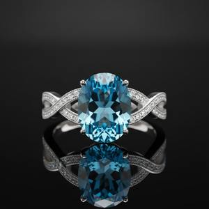 Bague de fiançailles minimaliste en argent sterling 925, sertie de pierres, sertie de diamants, taille ovale, topaze bleue, certifiée par un tiers - Product Image 1