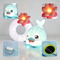 Ensemble de dauphins gonflables lumineux à LED personnalisés, anneau gonflable sur le thème de l'océan avec fleur de lotus
