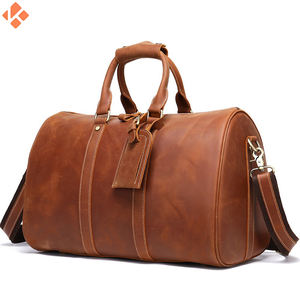 Sac polochon en cuir véritable de style nouveau sac de voyage de sport de plein air de couleur unique imperméable - Product Image 2