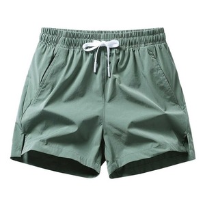 Short de course décontracté 2 en 1 à séchage rapide pour homme, taille élastique, motif solide, short d'entraînement de fitness avec poches intégrées - Product Image 4