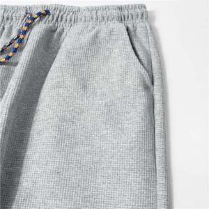 กางเกงจ็อกเกอร์ผ้าฝ้ายพิมพ์โลโก้ตามสั่ง กางเกงวอร์มผู้ชาย กางเกง OEM ผ้าฝ้ายผสมโพลีเอสเตอร์ สีเทาเฮเธอร์ ระบายอากาศได้ดี - Product Image 5