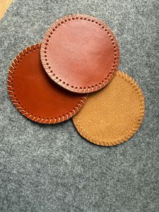 Durable leather coasters with artistic touch and refined edges perfect for upscale drink serving needs - Product Image 4
