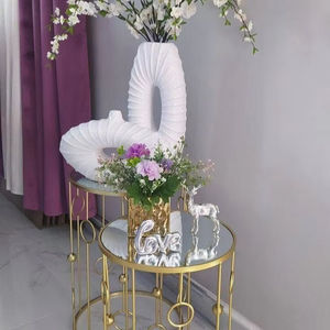 <b>White</b> Ornate Metal Flower Vase With Handcrafted Detailing Perfect For Displaying Seasonal Bouquets In Elegant Living Spaces - Product Image 1