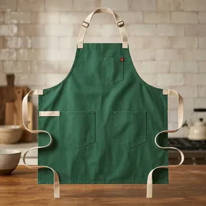 Delantal Clásico Verde de Lona Resistente y Reutilizable con Cintura Ajustable y Tres Bolsillos para Cocinar - Product Image 1