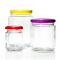 Bouteille en verre en conserve de fruits ronds transparents de qualité alimentaire de haute qualité Sauce chili bouteille de miel pot de confiture avec couvercle en fer blanc