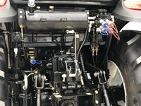Tracteur LOVOL M704 TB-3 d'occasion avec cabine 4x4 |   Tracteur agricole diesel 65 CV avec chargeur frontal à attache rapide Euro à vendre.