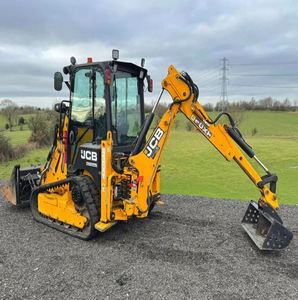 รถตักล้อยาง JCB 1CX น้ำหนักใช้งาน 2850 กิโลกรัม พร้อมระบบขับเคลื่อนสี่ล้อ และประตูข้างเพื่อความปลอดภัยเป็นพิเศษ - Product Image 2