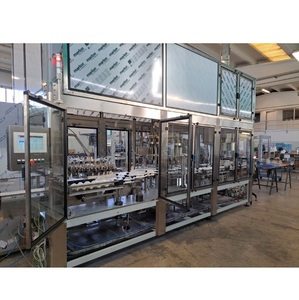 Machine de remplissage et de capsulage de bouteilles en verre de qualité supérieure utilisée dans les industries des boissons et de l'alimentation du fournisseur indien - Product Image 1