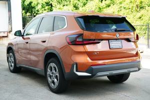 X1 BM-W สีส้มสะอาด xDrive28i ล้ออัลลอยด์แพ็กเกจหนังเบาะนั่งระบบนำทางสำหรับเล่นกีฬาซันรูฟรีโมต - Product Image 2