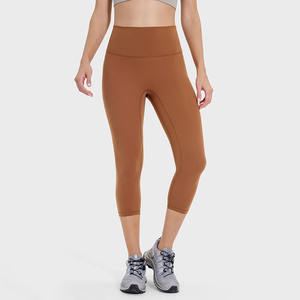 Collants de gymnastique athlétiques pour femmes 3/4 longueur taille haute Capris bout à bout couleurs unies sans couture avant beurre tissu poches sans couture - Product Image 2