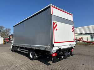 Nouveau camion Euro Cargo 140E280 à transmission automatique, formule 4x2, avec benne à plateau et bâche. - Product Image 6