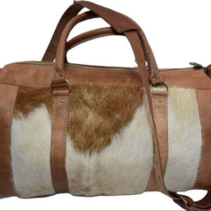 กระเป๋าทรงกระบอกหนังวัวแท้สไตล์วินเทจ รุ่น Unisex บุด้วยหนังแท้ ปิดด้วยซิปผ้าแคนวาส มีหูหิ้วสองข้าง เหมาะสำหรับการเดินทาง รุ่น Moroccansoul - Product Image 2