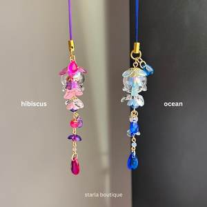 เสน่ห์ของโทรศัพท์แมงกะพรุนแก้ว: อุปกรณ์เสริมสำหรับชีวิตทางทะเลสุดน่ารักพร้อมลูกปัด - Product Image 2