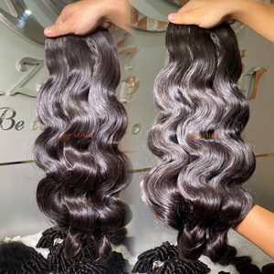 Venta al por mayor de extensiones de cabello humano vietnamita de alta calidad sensación de mano suave máquina de trama doble paquetes de cabello ondulado crudo 30 pulgadas - Product Image 1