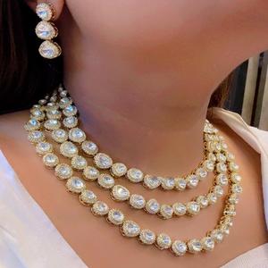 Conjunto de collar elegante con aspecto de piedra chapada en oro doble de moissanita de tres capas, pendientes para mujer, joyería de diseñador para ropa de boda - Product Image 1