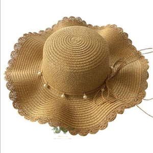 Sombrero de paja flexible diseñado con cuerda de perla femenina, buena protección solar para mujeres - Product Image 1