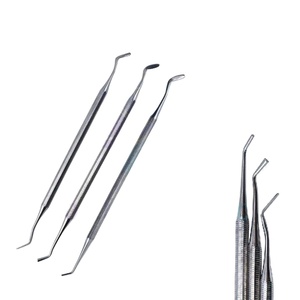 ไม้พายอุดฟันแบบสองด้าน ทำจากสแตนเลสสตีลผสม สำหรับงานอุดฟันด้วยเรซิ่น/อะมัลกัม พร้อมด้ามจับเพิ่มแรงบีบ - Product Image 1