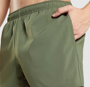 Short de gym avec logo personnalisé Short athlétique vert teint à taille élastique avec poches Short d'entraînement de natation pour homme couleur unie - Product Image 5