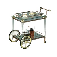 Grand chariot de service moderne en métal argenté avec miroir transparent brillant, élégant et Antique pour le dîner et le déjeuner