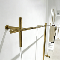 Porte-vêtements sur pied simple en tuyau industriel moderne, combinaison de présentoir mural pour magasin de vêtements