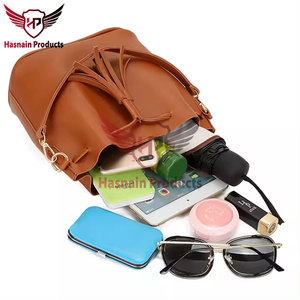 Colección de bolsos de alta calidad: bolsos de mano de cuero genuino con color y logotipo personalizados, ideales para declaraciones de moda diarias - Product Image 3
