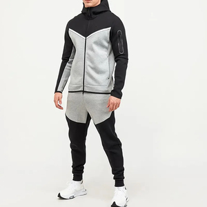 Ensemble de jogging pour homme avec sweat-shirt sportif à capuche et fermeture éclair intégrale, color-block, poches latérales, respirant, en polyester et élasthanne - Product Image 1