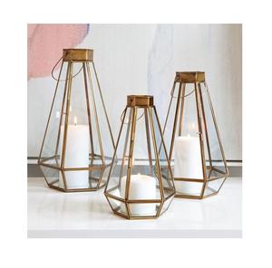 Linterna de vela de metal y vidrio de Venta caliente en marco de alambre con acabado dorado con marco geométrico para decoración de interiores - Product Image 1