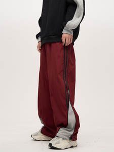 Pantalones cortavientos holgados de gran tamaño para hombre, ropa de calle de fabricante personalizada, pantalones de chándal usados de nailon con el mejor material para hombre - Product Image 4