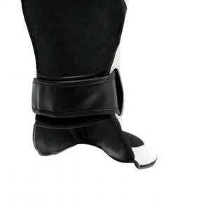 Espinilleras más vendidas Estilo único Logotipo personalizable Precio bajo Protección deportiva de fútbol para adultos Hecho de cuero elástico Nylon PU - Product Image 3