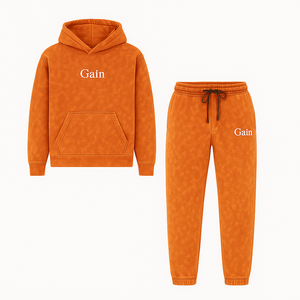 Ensemble de survêtement streetwear d'hiver orange délavé à l'acide et usé avec logo Gain, comprenant un sweat à capuche et un pantalon de jogging - Product Image 1