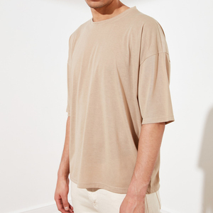 เสื้อยืดพิมพ์โลโก้ตามสั่ง OEM เสื้อยืดคอตตอน 100% พิมพ์โลโก้ตามสั่ง เสื้อยืดโอเวอร์ไซส์สำหรับผู้ชายและผู้หญิง ผู้ผลิตในปากีสถาน - Product Image 1