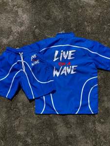 Conjunto corto deportivo personalizado, traje transpirable de nailon 100%, chaqueta cortavientos, conjunto de Polo y pantalones cortos con cremallera, conjunto de Jogger - Product Image 5