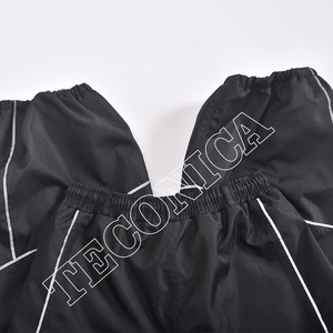 Pantalones de nieve negros con ribetes reflectantes, impermeables y resistentes al viento con forro polar, ajuste holgado y dobladillo elástico para aventuras en la nieve - Product Image 6