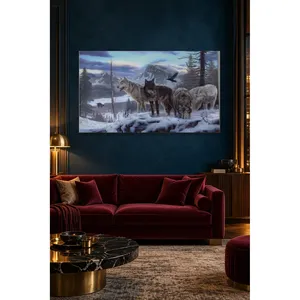 Impression sur toile de Fida Wolf Pack et de Raven dans les montagnes enneigées - Product Image 1