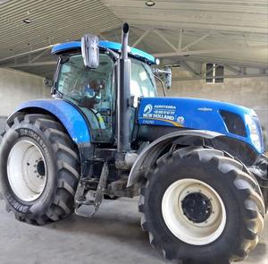 Nuevo tractor de segunda mano H. O. L. L. A. N. D con cargador, equipo agrícola, maquinaria agrícola a la venta - Product Image 1