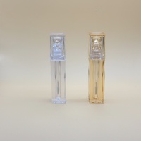 Vente en gros Tube de brillant à lèvres en plastique jaune rose Récipient cosmétique vide avec pinceau applicateur intégré Flacon de brillant à lèvres