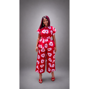 Set Due Pezzi in Cotone Rosso Ankara con Top Corto e Pantaloni con Disegni Triangolari Bianchi - Product Image 2