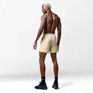 Lightweight Moisture Wicking Fabric Sand Essential 5 Inch Shorts with Contour Side Panels and Inner <b>Mesh</b> <b>Pants</b> - Product Image 3