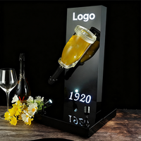 Présentoir de présentation de bouteille de vin rougeoyant avec logo personnalisé Présentoir de bouteille de champagne en acrylique rotatif à 360 ° à LED