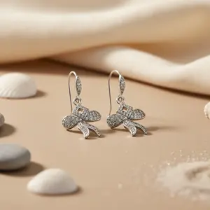Boucles d'oreilles fines pour femmes avec nœud en argent et pierres en oxyde de zirconium, cadeau de bijoux - Product Image 1