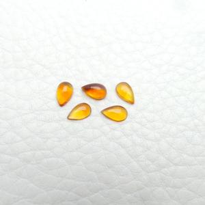 Cabujón de citrino natural corte suave 5x7mm forma de pera piedra preciosa amarilla para la fabricación de joyas por Kiran & Sons Gems Co India - Product Image 1