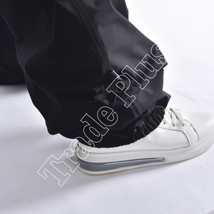 Uniesx Nouveau Pantalon de ski personnalisé en usine en tissu polyester imperméable et coupe-vent Pantalon de ski DTG brodé avec poches - Product Image 5