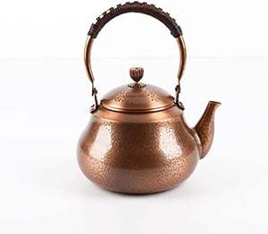 Bouilloire à thé en cuivre, design classique, construction métallique, durable, pour une distribution de chaleur optimale et une saveur de thé authentique - Product Image 1