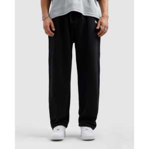 Pantalones plisados negros esenciales con corte holgado - Product Image 4