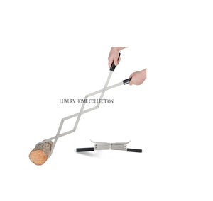 Handmade metal fire pit tools with ergonomic wooden grips and decorative design for stylish and functional fire maintenance - Product Image 1