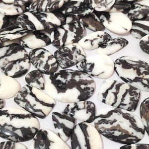 Venta al por mayor Natural negro cebra jaspe piedras preciosas cojín corte Oval pera corte elegante pulido cabujones para la fabricación de joyas curativas - Product Image 1