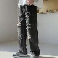 Jeans baggy à la mode avec jambe large et jean baggy en coton doux avec braguette à boutons et design classique à cinq poches