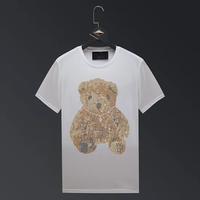 T-shirt homme Savage en jersey de coton à manches courtes, col rond, style urbain, coupe classique, avec strass et logo frontal, séchage rapide et respirant